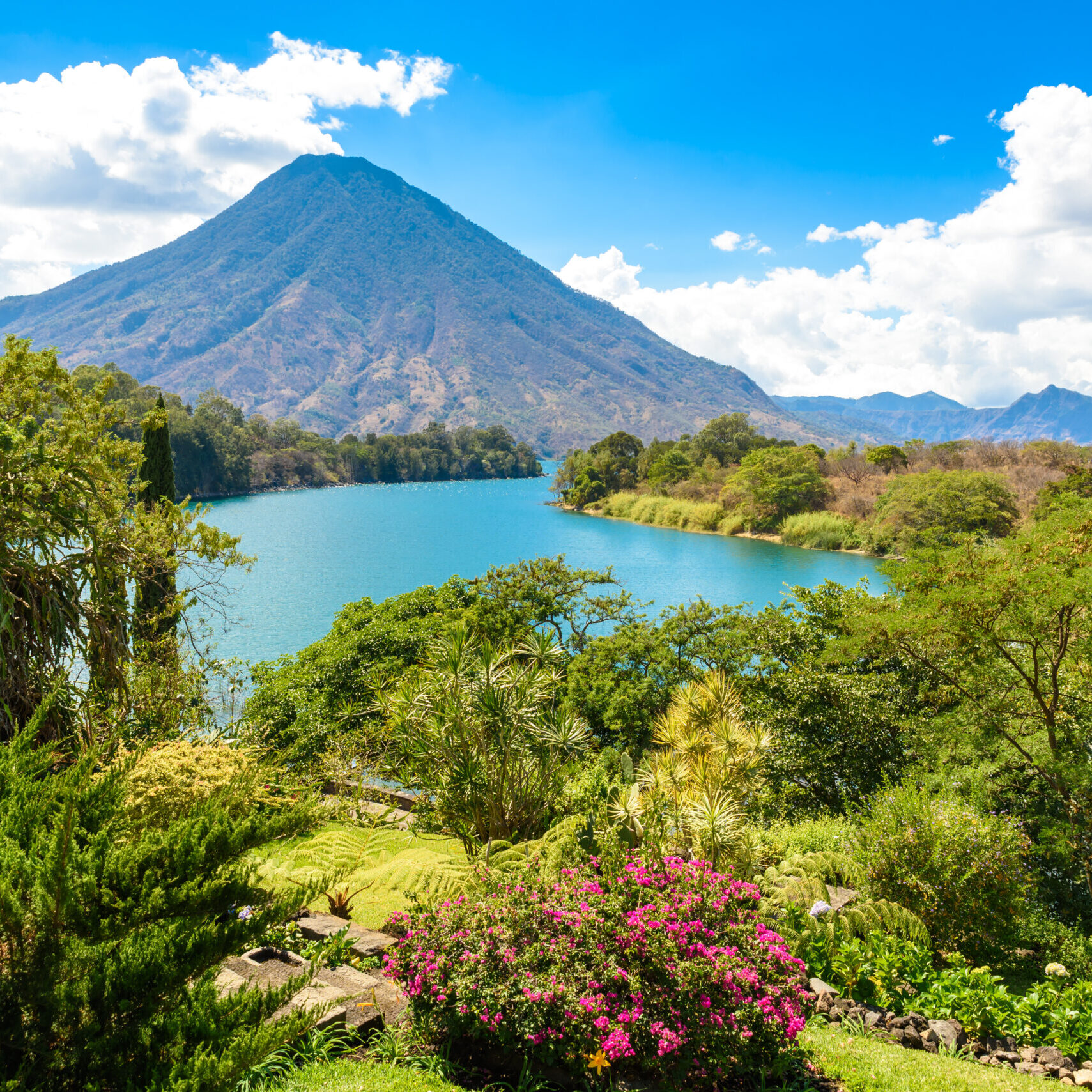 Lake Atitlan with view to Volcano San Pedro in highlands of Guatemala